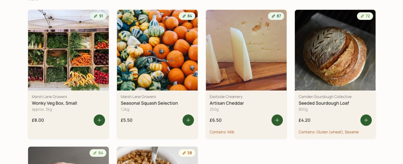 The GreenBasket product grid: six product cards each showing an Impact Score badge, producer name, weight, price, and: where relevant: an allergen warning such as “Contains: Gluten (wheat), Sesame”.